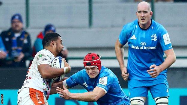 Leinster's Josh van der Flier tackles Benetton's Toa Halafihi at the Stadio di Monigo