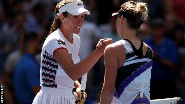 Johanna Konta shakes hands with Elina Svitolina at the net