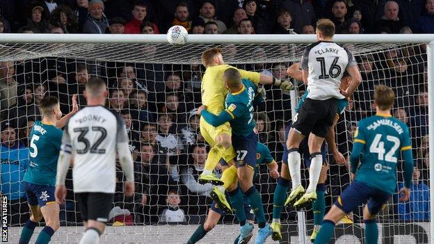 Matt Clarke heads in a goal for Derby against Hull