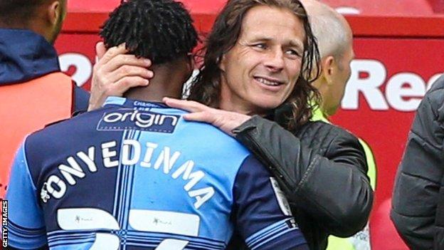 Wycombe boss Gareth Ainsworth consoles Fred Onyedinma