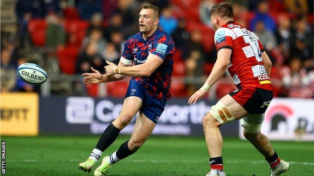 Samuel Bedlow passes the ball for Bristol Bears against Gloucester