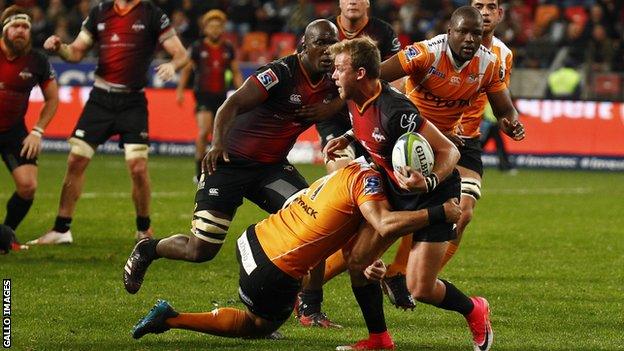 Southern Kings' Rudi van Rooyen is tackled during a match against Cheetahs