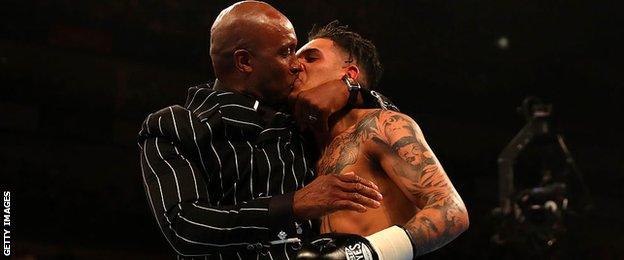 Nigel Benn embraced son Conor after his win