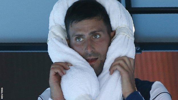 Novak Djokovic attempts to cool down in Melbourne