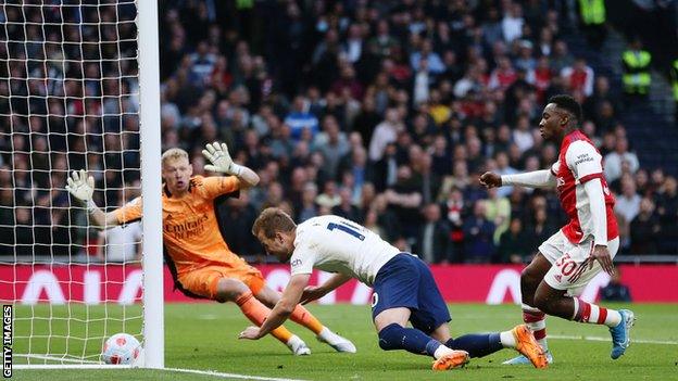 Harry Kane heads in Tottenham's second against Arsenal