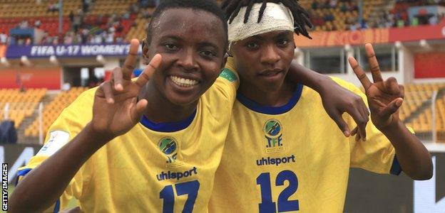 Christer Bahera and Diana Mnally celebrate against France