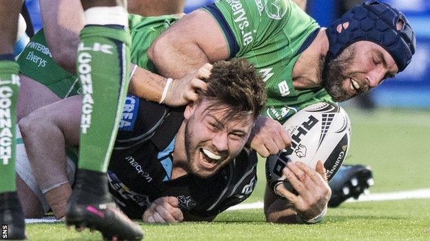 Glasgow scrum-half Ali Price celebrates scoring his side's third try against Connacht