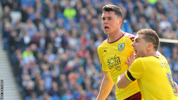 Burnley's Michael Keane (left) is congratulated by Sam Vokes