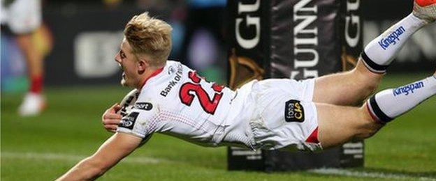 Ulster replacement wing Rob Lyttle dives over under the posts for his team's second try against Munster