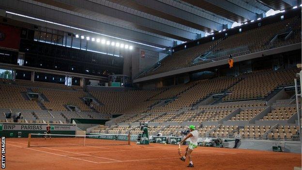 Rafael Nadal plays under the Court Philippe Chatrier floodlights at the 2020 French Open