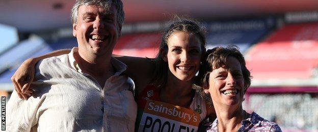 Isobel Pooley with her parents