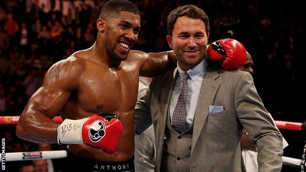 Anthony Joshua poses with Eddie Hearn