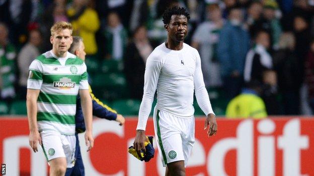 Celtic defender Efe Ambrose walks off after drawing in in their Europa league match against Fenerbahce 2-2.