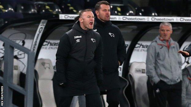 Wayne Rooney screams instructions at his team