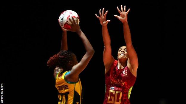 Shanice Beckford of Jamaica and Stacey Francis Bayman