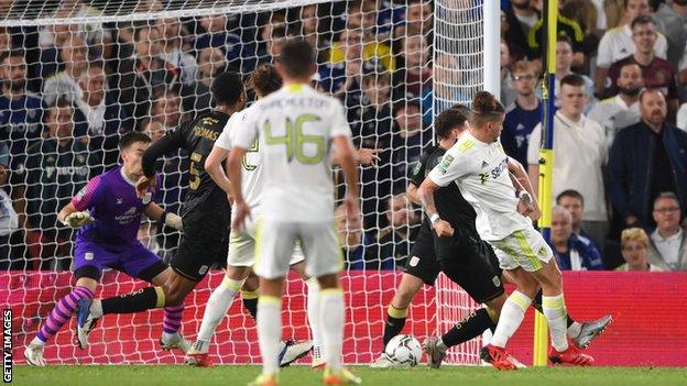 Leeds' Kalvin Phillips scores against Crewe