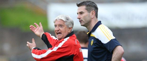 Derry manager Brian McIver and Donegal counterpart Rory Gallagher