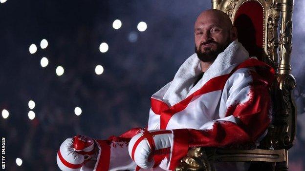 Tyson Fury sat on a throne