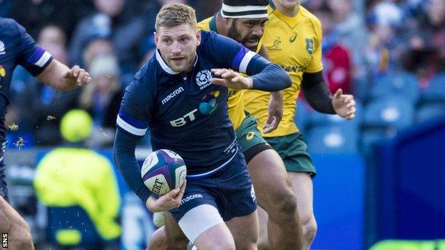 Finn Russell takes on the Australia defence for Scotland