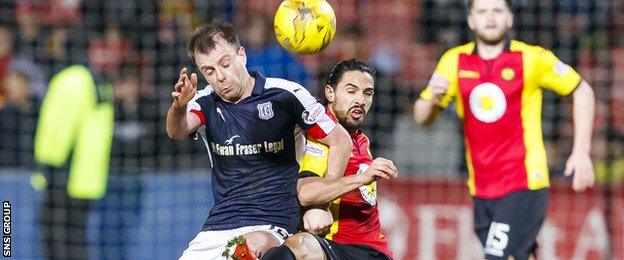 Ryan Edwards tussles with Paul McGowan