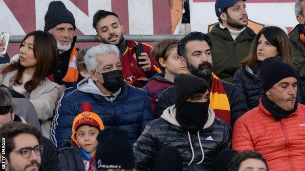 Roma fans take coronavirus precautions