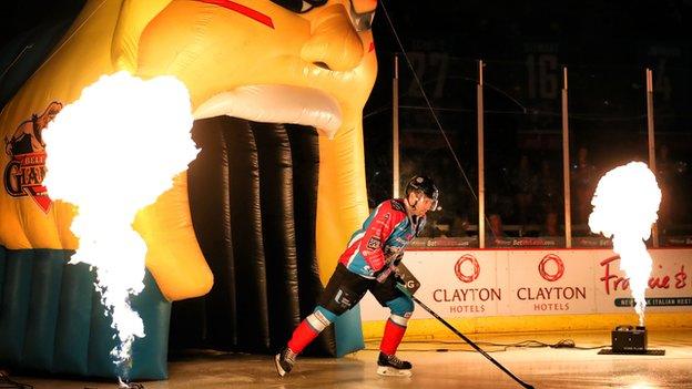 Belfast Giants player-coach Derrick Walser enters the arena