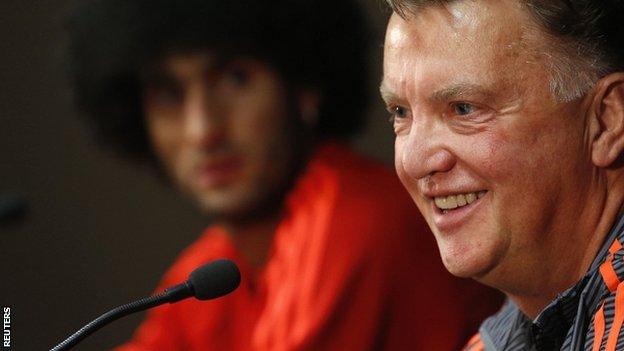 Marouane Fellaini and Louis van Gaal