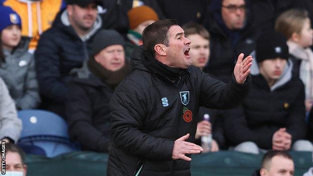 Nigel Clough on the sideline for Mansfield Town