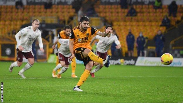 Ruben Neves scores Wolves' penalty against Arsenal