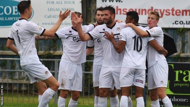 Matt Wright is congratulated by his teammates after scoring Truro's opening goal at Gosport Borough