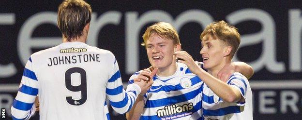 Morton's Alex Samuel (centre) celebrates scoring