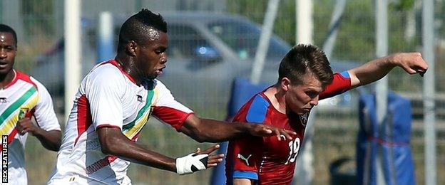 Lassana Coulibaly (left) in action for Mali Under-20s