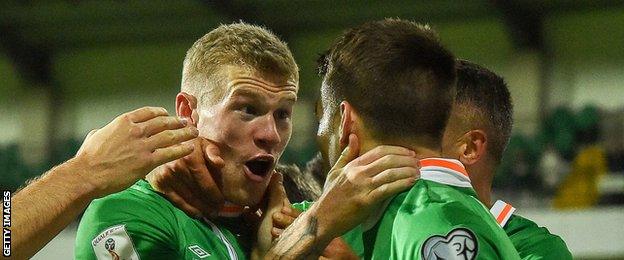 James McClean in congratulated after one of his second-half goals in Moldova