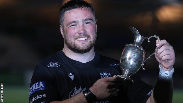 Zander Fagerson with the cup after Glasgow won last season