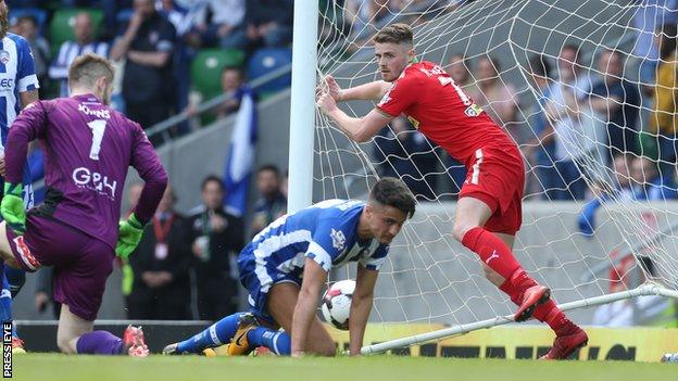 Rory Donnelly after hammering in Cliftonville's equaliser from close range