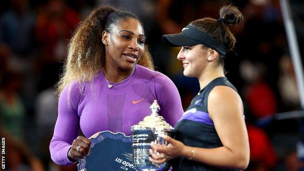 Serena Williams speaks to Bianca Andreescu on the US Open podium