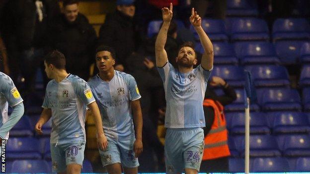 Matt Godden headed his 13th goal of the season to keep Coventry are level on points with Rotherham at the top of League One