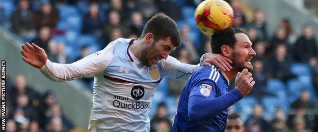 Villa's Gary Gardner challenges Cardiff City's Sean Morrison