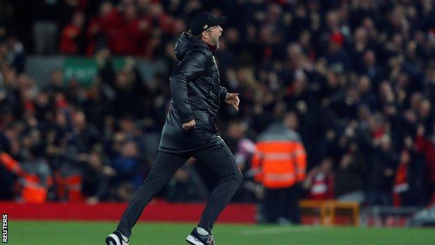 Jurgen Klopp races on to the pitch at Anfield