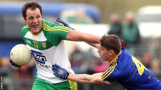 Donegal captain Michael Murphy is challenged by Roscommon's Niall McInerney at Letterkenny