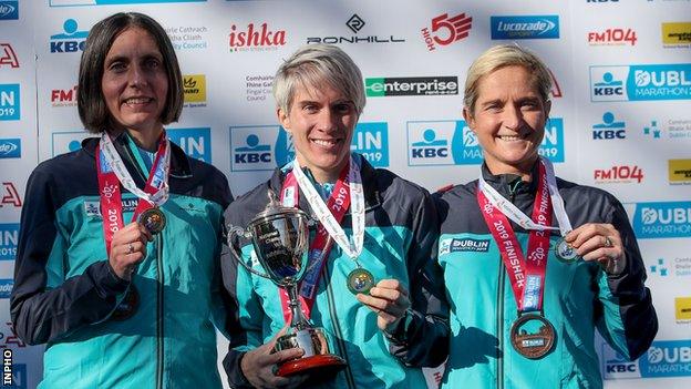 Gladys Ganiel, women's Irish title winner Aoife Cooke and Ann-Marie McGlynn on the podium