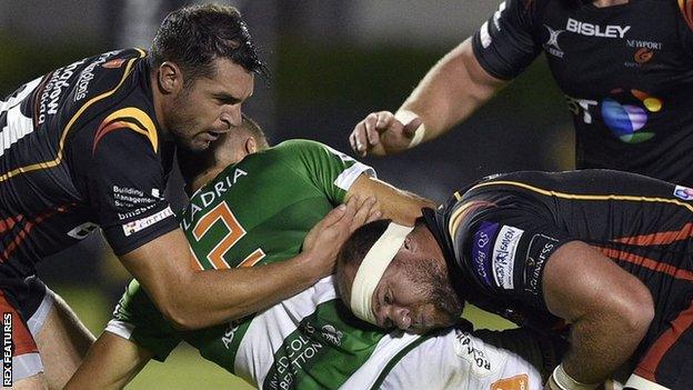 Alberto Sgarbi is tackled by Luc Jones of Newport Gwent Dragons