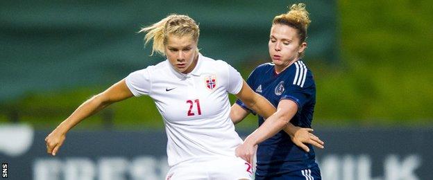 Norway's Ada Stolsmo Hegerberg (left) battles with Joanne Love