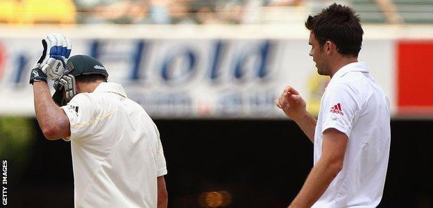 James Anderson is shooed away by Mike Hussey during the 2010 Ashes in Australia