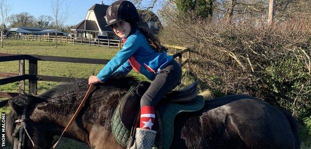 Maisy's Dad Thom tweeted that his daughter was inspired by Rachael Blackmore's performances. Here she is with her pony, Burt