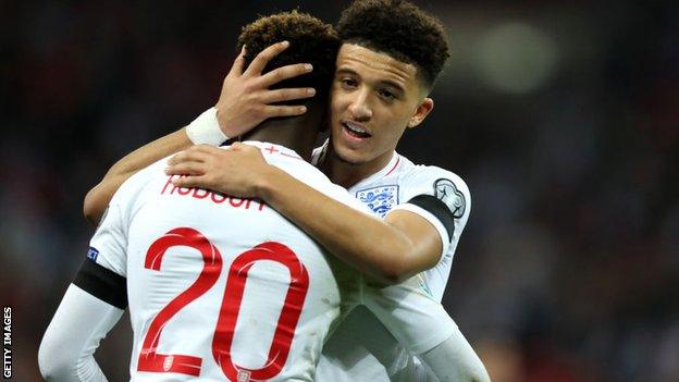 Jadon Sancho and Callum Hudson-Odoi celebrate