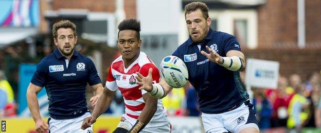 Sean Lamont playing for Scotland against Japan