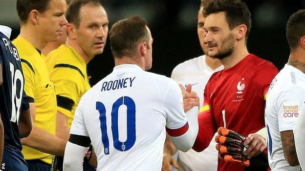 Wayne Rooney and Hugo Lloris