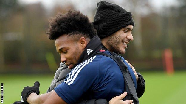 Wolves player Raul Jimenez and Adama Traore