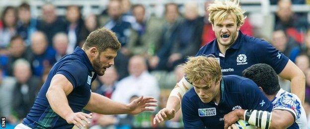 Scotland players Ross Ford, Jonny Gray and Richie Gray in action against Samoa